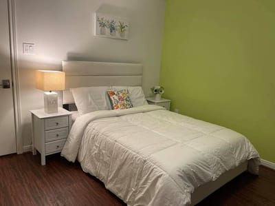 Cozy private resident room with a bed and decor