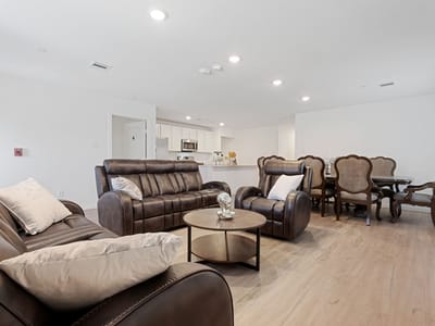 Modern living area with comfortable seating and dining table