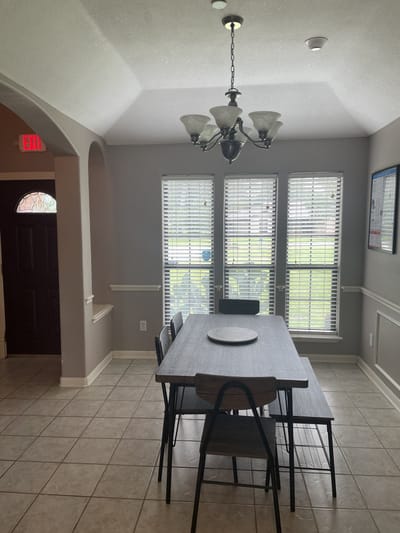 Dining area with a table and chairs