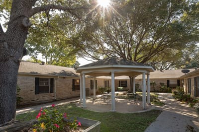 Outdoor courtyard with gazebo and seating area