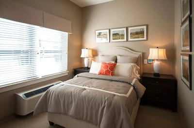 Cozy private resident room with a bed and decor