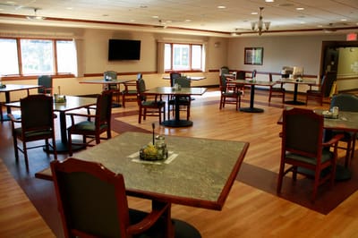 Dining room area with tables and chairs