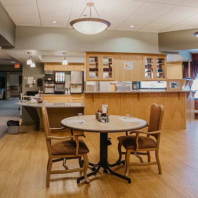 Bright dining area with table and chairs