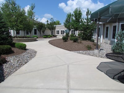 Well-maintained outdoor space with pathways and greenery