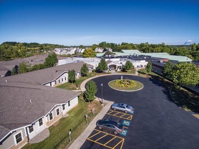 Aerial view of the McHarrie Pointe facility with gardens and parking