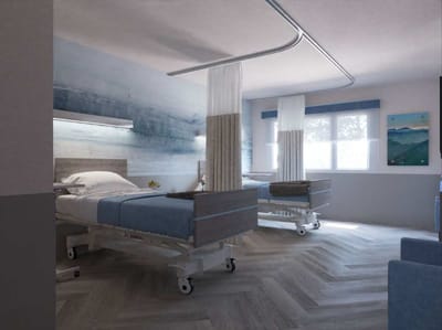 Interior view of a shared resident room with hospital beds