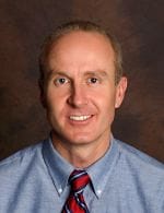 North Big Horn Hospital District, Nursing Home in Douglas, WY — Smiling professional in a formal shirt and tie