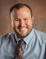 North Big Horn Hospital District, Nursing Home in Douglas, WY — Professional headshot of a smiling man in a shirt and tie