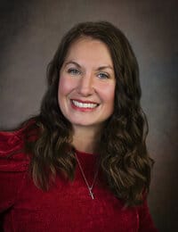 North Big Horn Hospital District, Nursing Home in Douglas, WY — Smiling woman with long hair in a red top