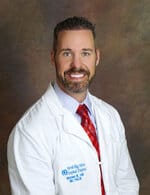 North Big Horn Hospital District, Nursing Home in Douglas, WY — Smiling doctor in a white coat with a tie
