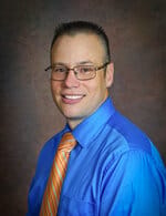 North Big Horn Hospital District, Nursing Home in Douglas, WY — Portrait of a man in a blue shirt and orange tie