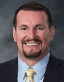 North Big Horn Hospital District, Nursing Home in Douglas, WY — Professional headshot of a smiling man in a suit