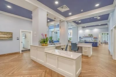 Sunny interior common area with a reception desk