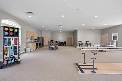 Interior view of an activity room with rehabilitation equipment
