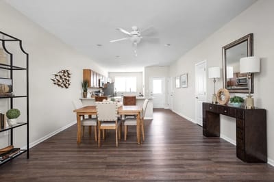 Bright dining area with wooden furniture