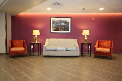 Bright common area with seating and artwork