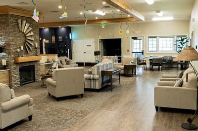 Interior view of a bright common area with seating