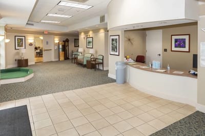 Bright lobby with seating and reception desk
