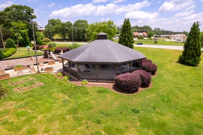 A beautiful gazebo in a green outdoor space