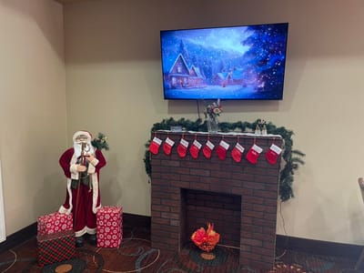 Festive decor with Santa and stockings indoors