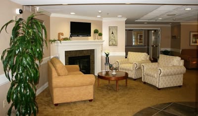 Comfortable common area with seating and fireplace