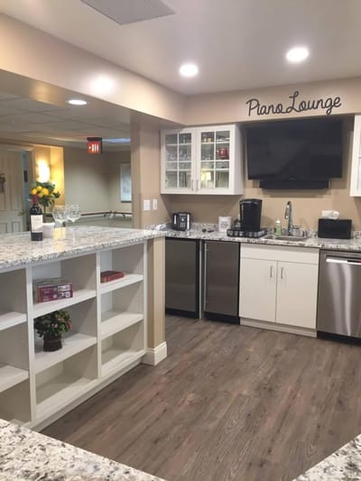 Interior view of a lounge area with a counter and seating
