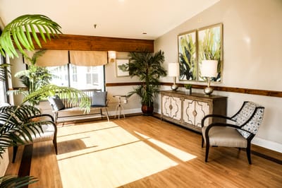 Bright common area with seating and plants