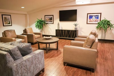 A cozy common area with seating and decor