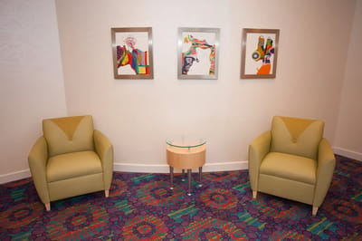 Bright community lounge with colorful artwork