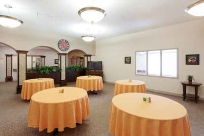 Common area with tables set up for activities