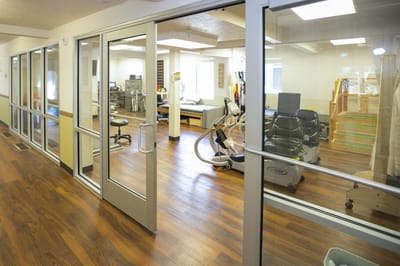 Interior view of a rehabilitation area with therapy equipment