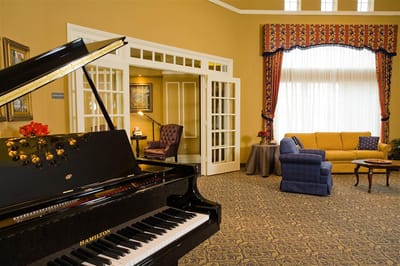 Lobby area with piano and seating