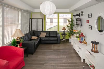 Bright common area with seating and decor
