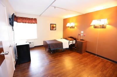 A well-furnished private resident room