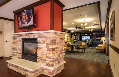 Interior view of a common area with a fireplace