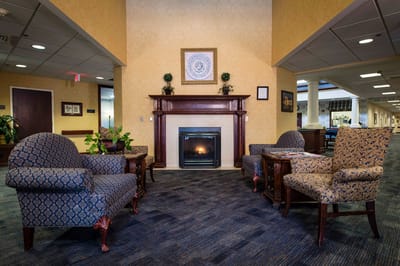Comfortable lounge area with fireplace and seating