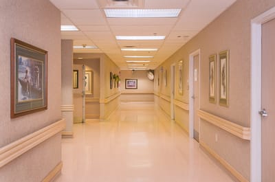 Bright corridor with artwork and seating