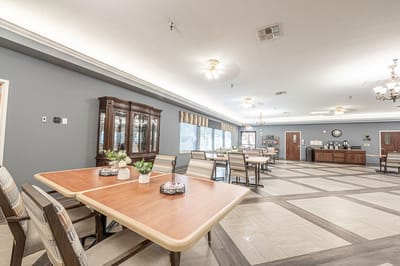 Bright common area with tables and seating