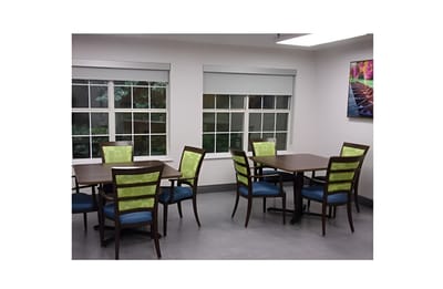 Bright dining area with chairs and tables