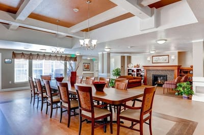Bright and spacious common area with a dining table