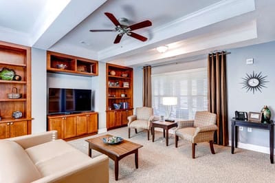 Elegant lounge area with seating and decorative elements