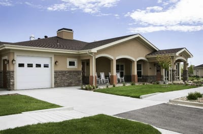 Exterior view of a residential-style building with a garden