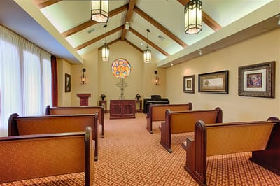 Interior view of a facility chapel with wooden benches