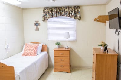Personalized resident room with bed and furniture