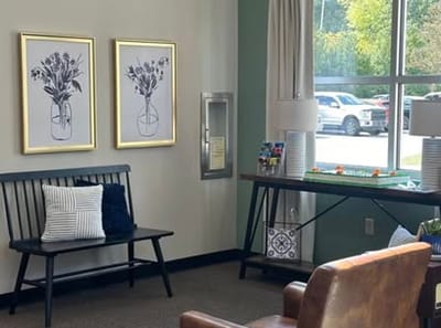 Bright lounge area with seating and decorations
