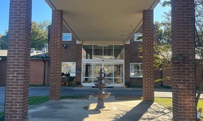 Entrance of the facility with a fountain