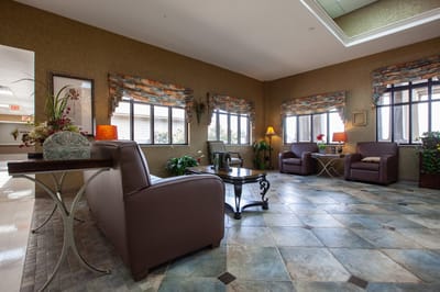 Interior view of a cozy common area with seating