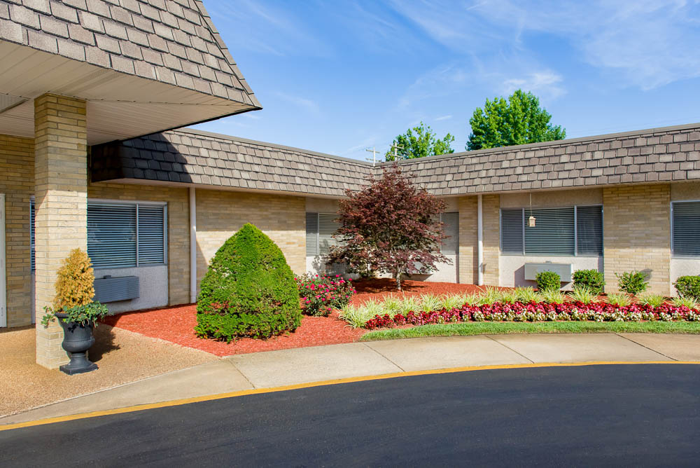 Exterior view of the facility entrance with landscaping