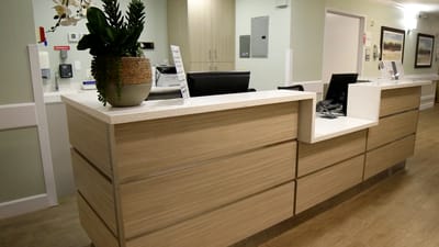 Reception desk area inside a senior care facility