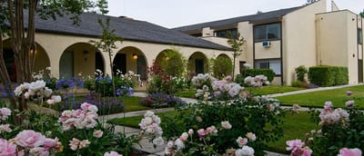 Exterior view of the nursing home with flowers